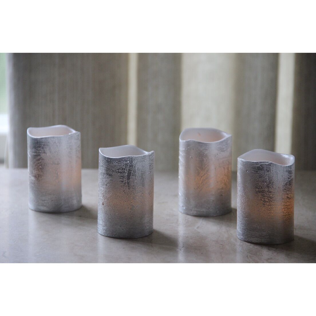 61040006SL SET OF 4 LED SILVER METALLIC VOTIVE CANDLES