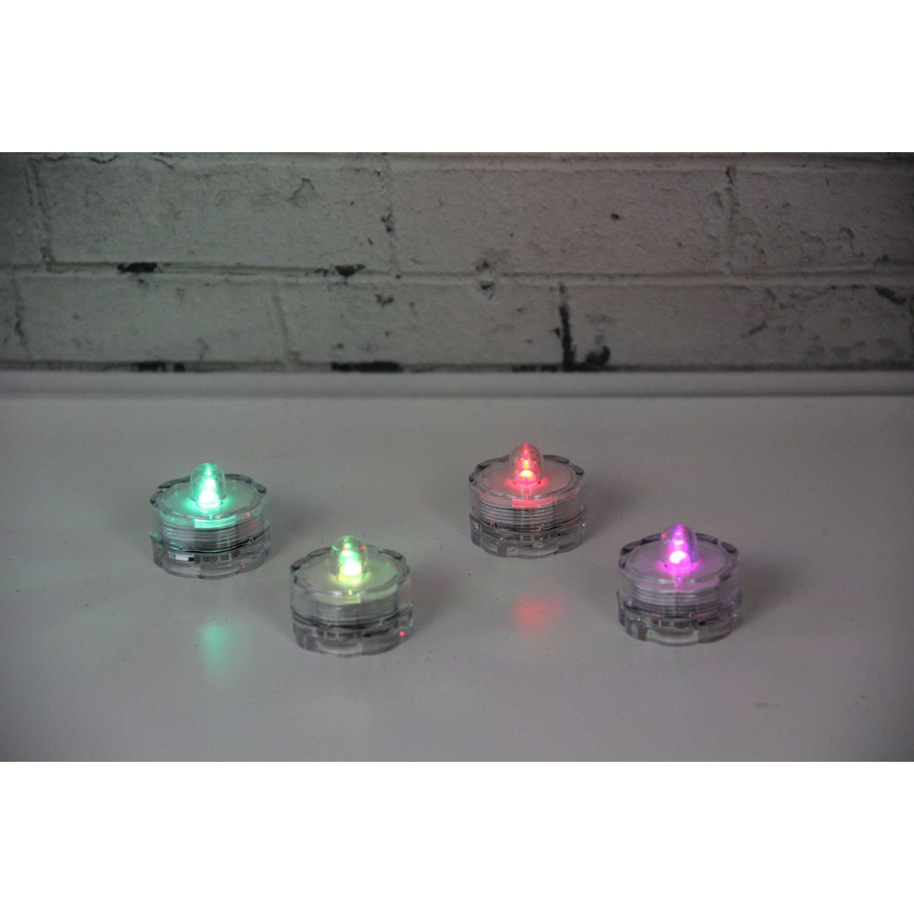 71040025 SET 4 OF SUBMERSIBLE LED TEA LIGHTS